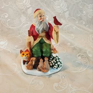 Lenox Santa in chair with animals